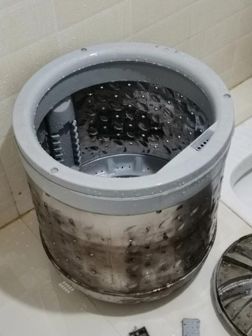 洗衣机怎么拆开清理里面的脏东西（洗衣机怎么自己清理里面的脏东西）